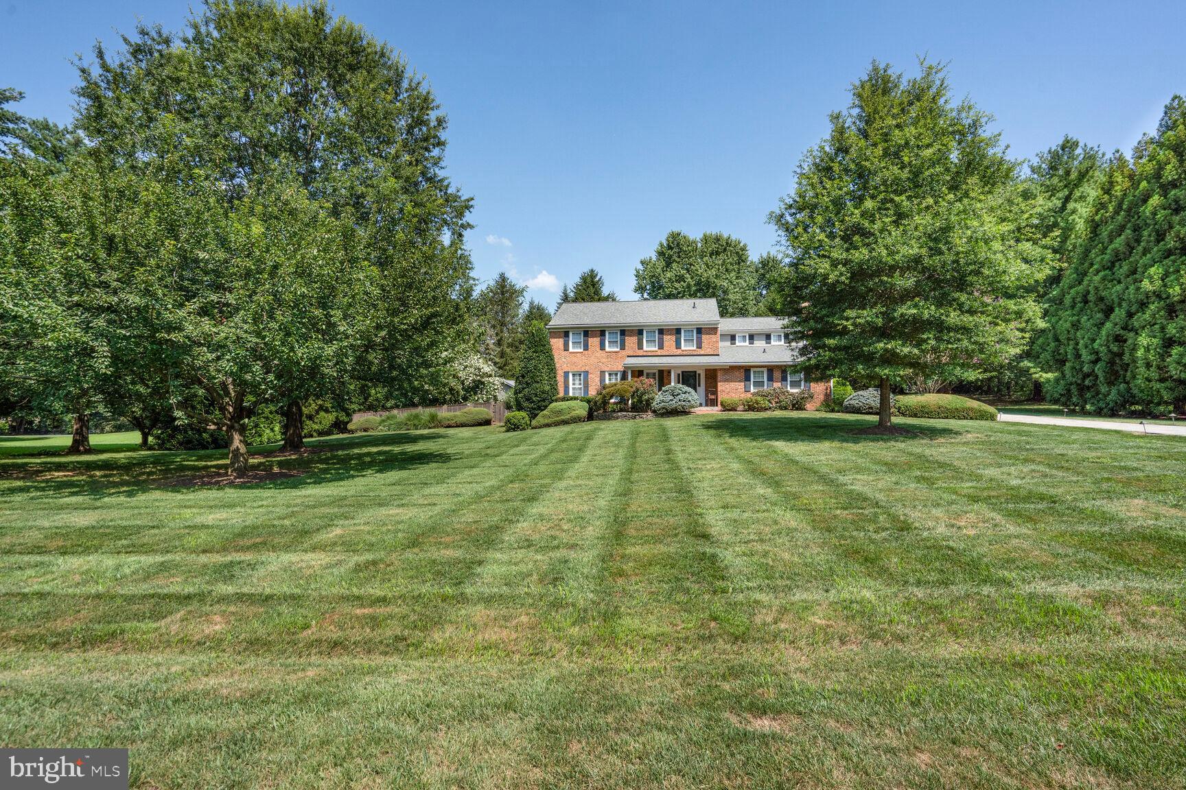 10904 Equestrian Court Reston, VA 20190 - Photo 76 of 81 a view of a house with a big yard