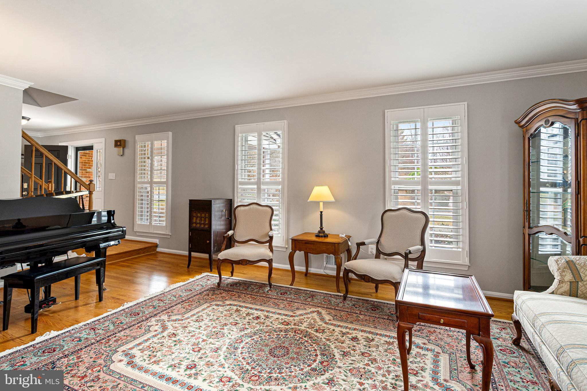 10904 Equestrian Court Reston, VA 20190 - Photo 9 of 81 a living room with furniture a rug and a window