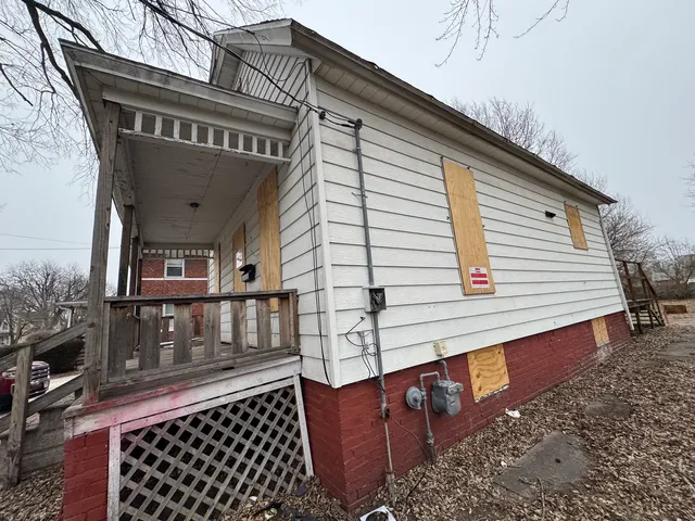 a view of a house with a deck