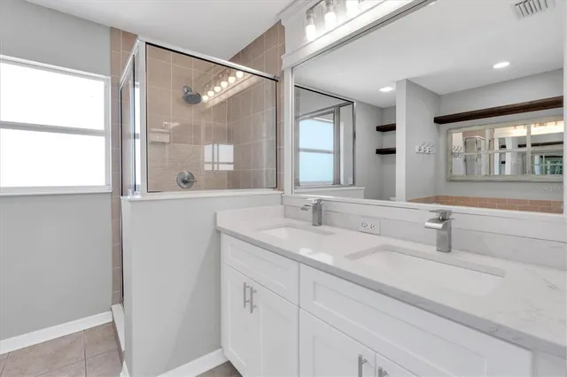 a white bath tub sitting next to a window