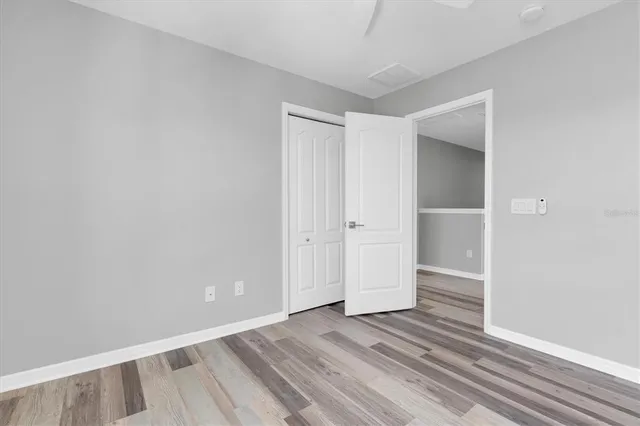 a view of a room that has a large window