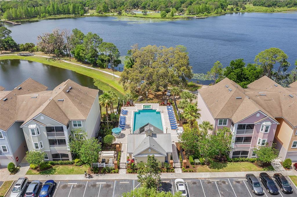 3446 Soho Street, Unit 303 Orlando, FL 32835 - Photo 2 of 47 an aerial view of a house with a lake view