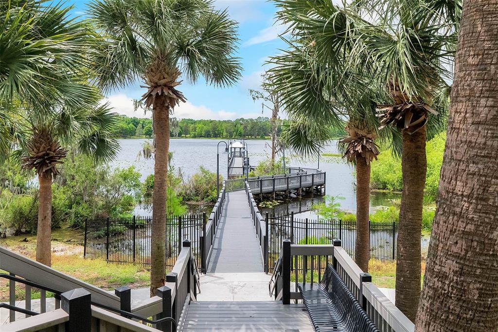 3446 Soho Street, Unit 303 Orlando, FL 32835 - Photo 33 of 47 a view of lake from balcony with seating space