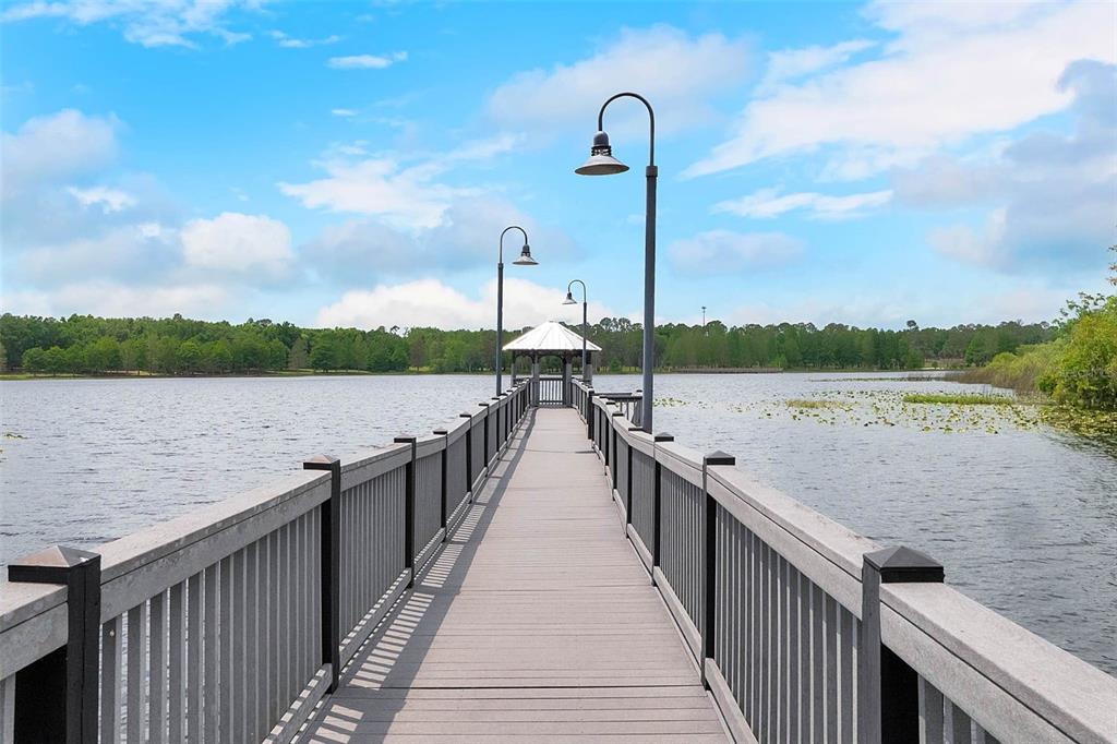 3446 Soho Street, Unit 303 Orlando, FL 32835 - Photo 35 of 47 a view of a wooden bridge