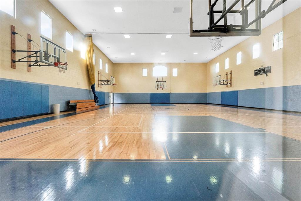 3446 Soho Street, Unit 303 Orlando, FL 32835 - Photo 37 of 47 a view of a hall with stairs