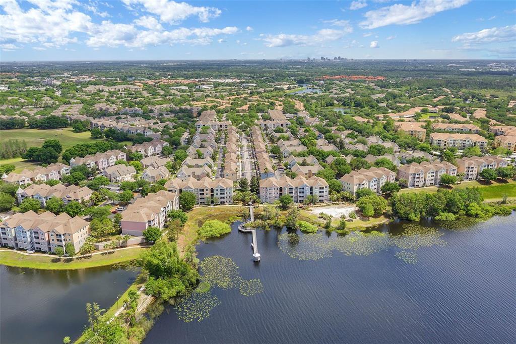 3446 Soho Street, Unit 303 Orlando, FL 32835 - Photo 42 of 47 a view of a city with ocean