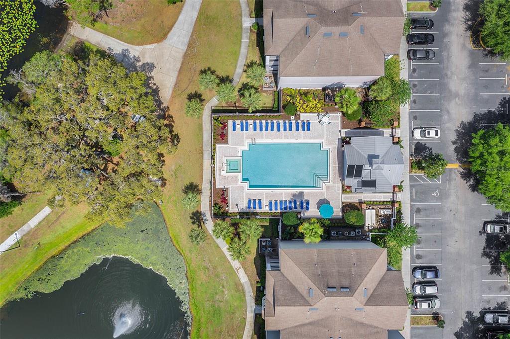 3446 Soho Street, Unit 303 Orlando, FL 32835 - Photo 43 of 47 an aerial view of a swimming pool
