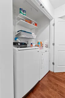 a bedroom with bed and a window