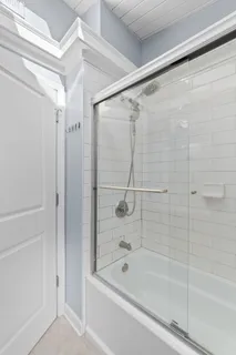 a view of a yoga room with wooden floor