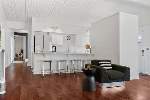 a kitchen with cabinets a sink and a stove