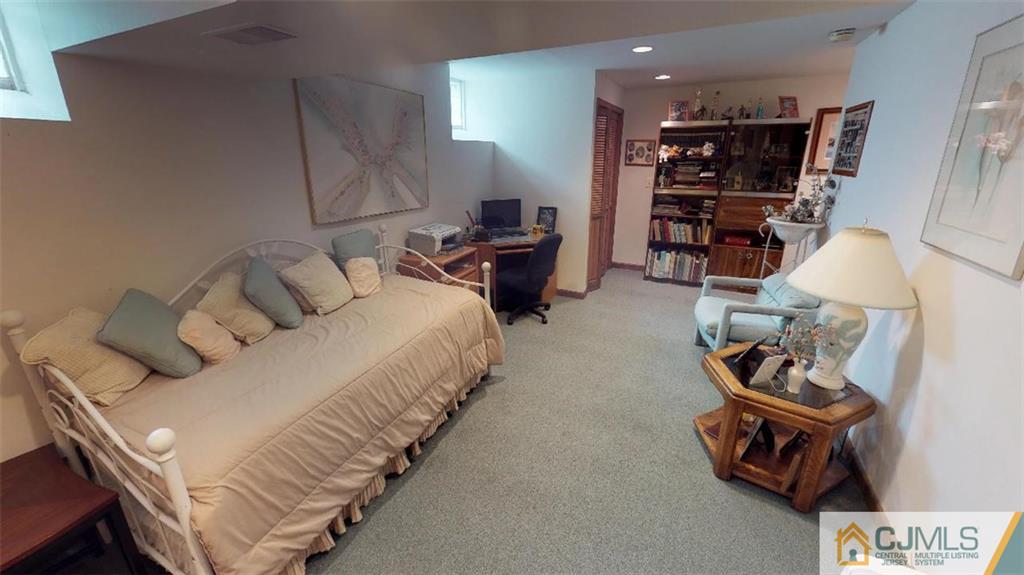 16 Sweet Gum Road Howell, NJ 07731 - Photo 17 of 21 a bed room with bed and window