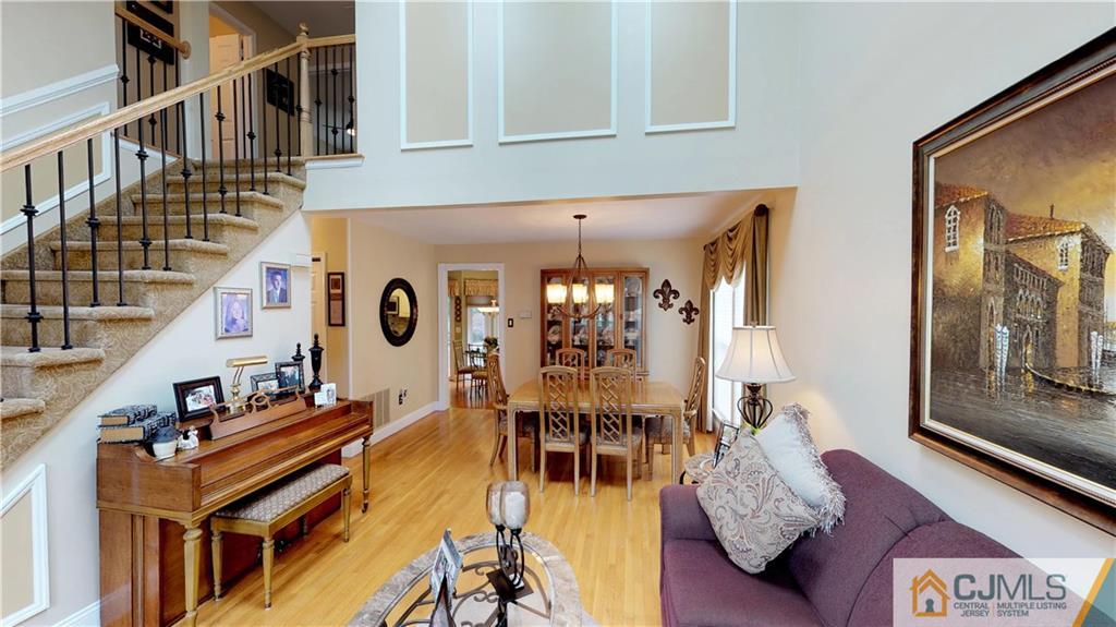 16 Sweet Gum Road Howell, NJ 07731 - Photo 3 of 21 a living room with furniture and wooden floor