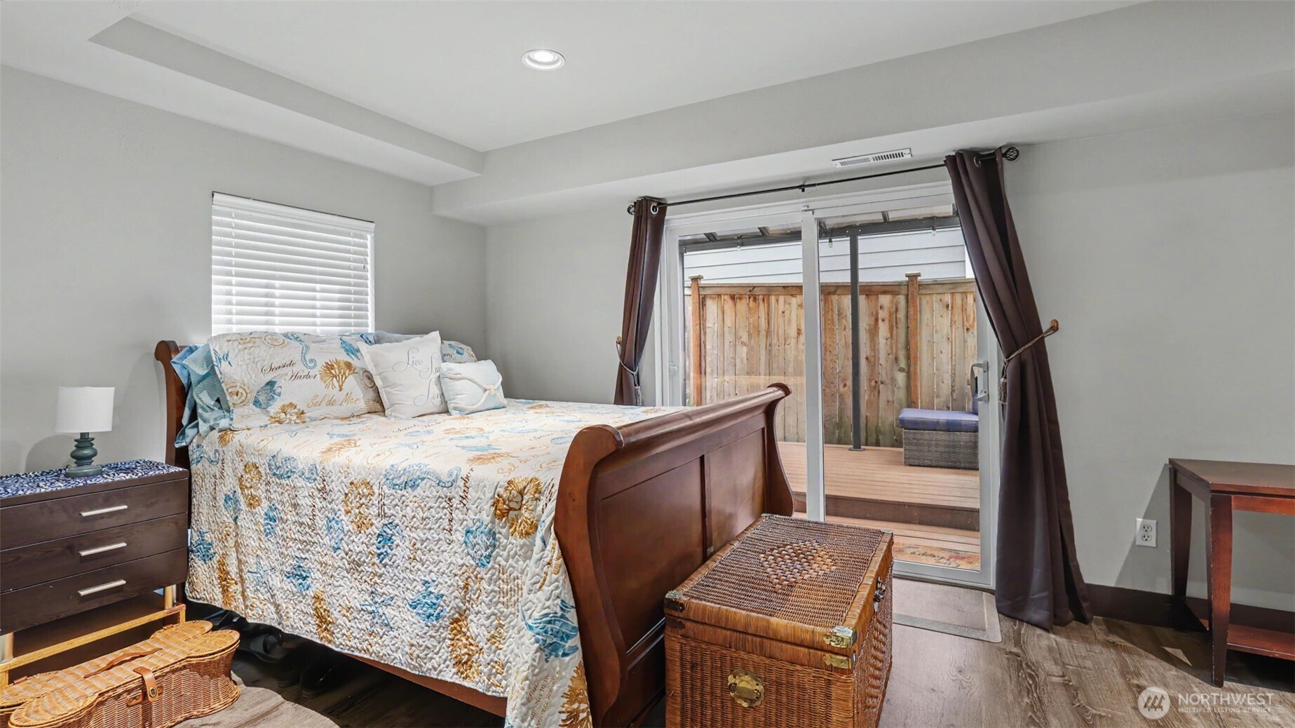 1357 Elma Place Northeast Renton, WA 98059 - Photo 33 of 40 a bedroom with bed and wooden floor