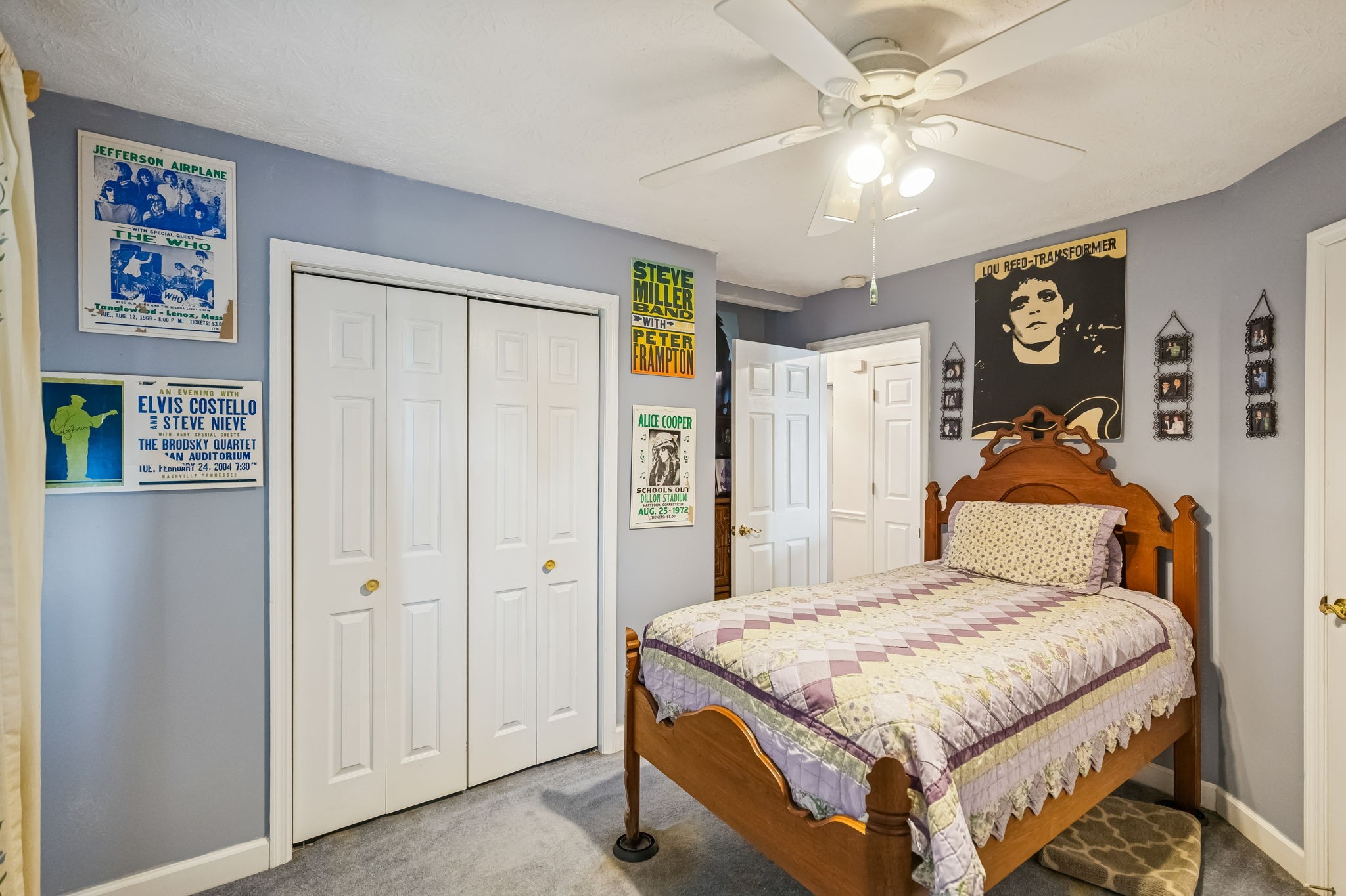 111 Eldon Drive Manchester, TN 37355 - Photo 13 of 24 a bedroom with a large bed and a chandelier