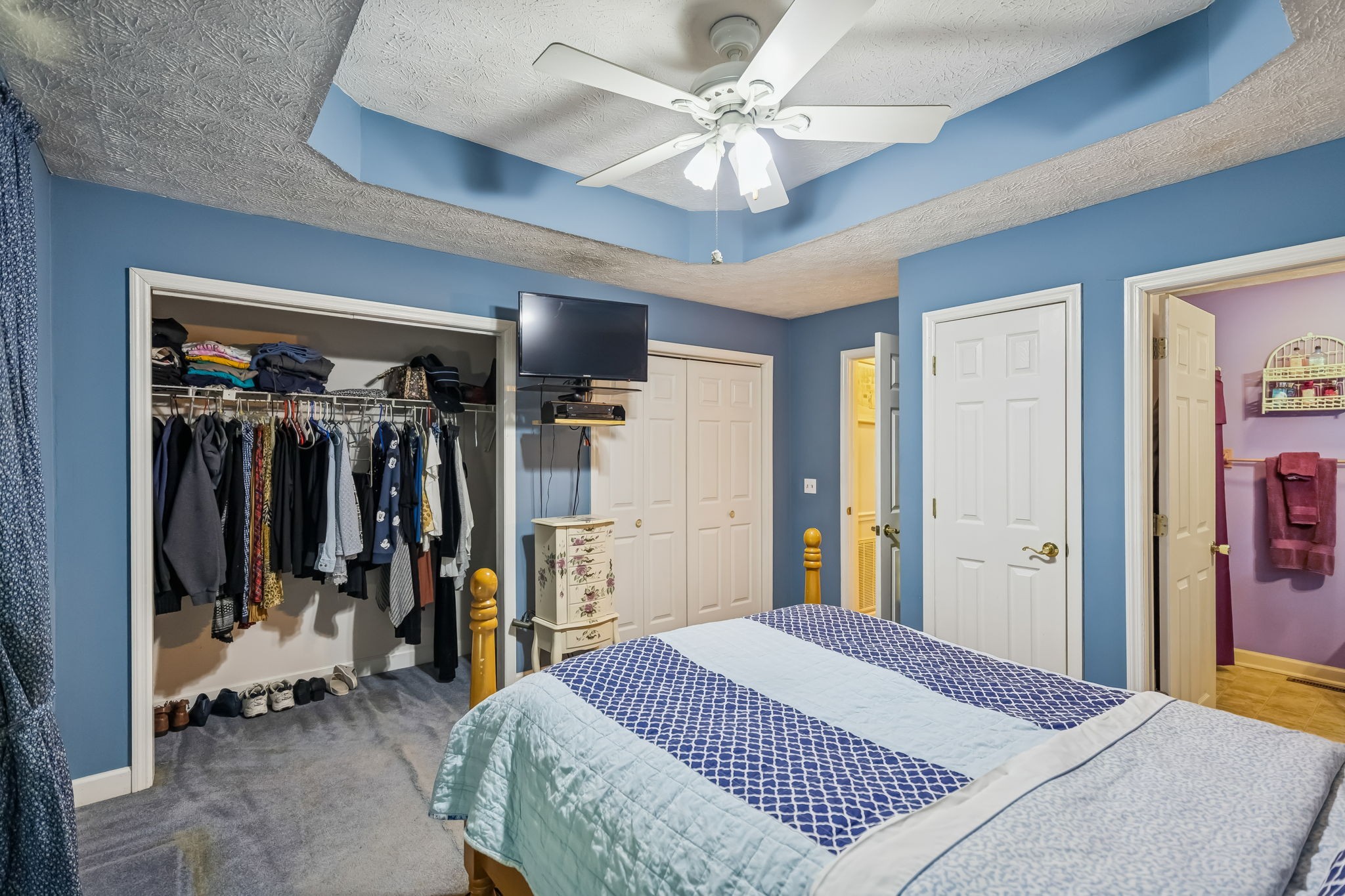 111 Eldon Drive Manchester, TN 37355 - Photo 16 of 24 a bed room with a bed and a walk in closet