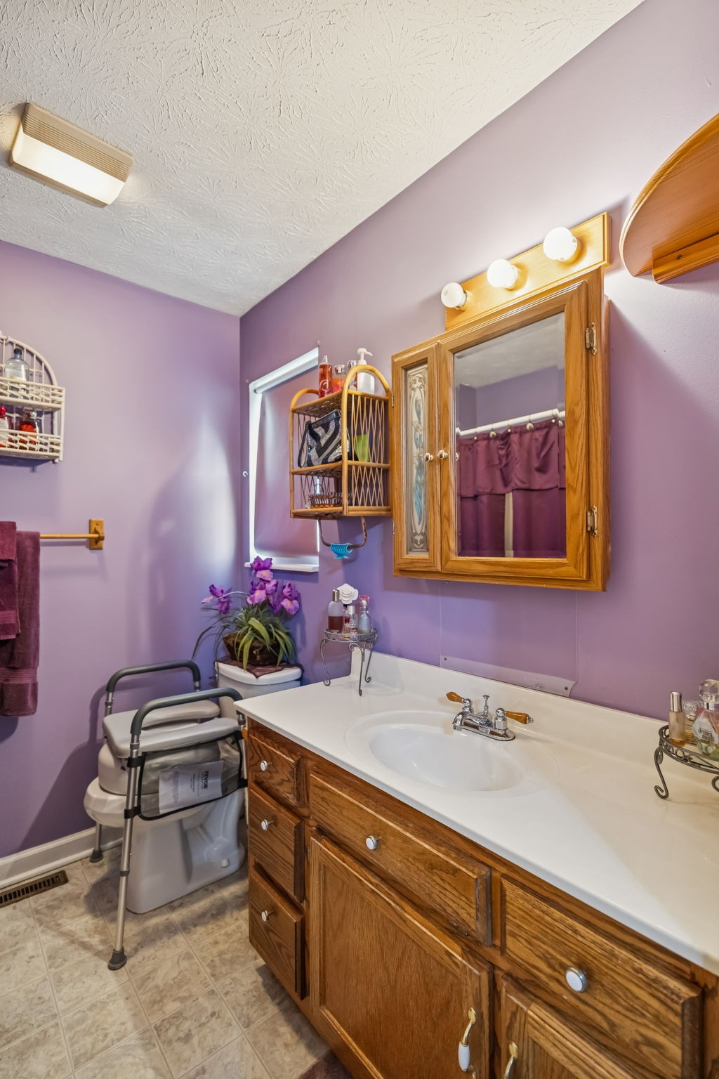111 Eldon Drive Manchester, TN 37355 - Photo 17 of 24 a bathroom with a sink and a mirror