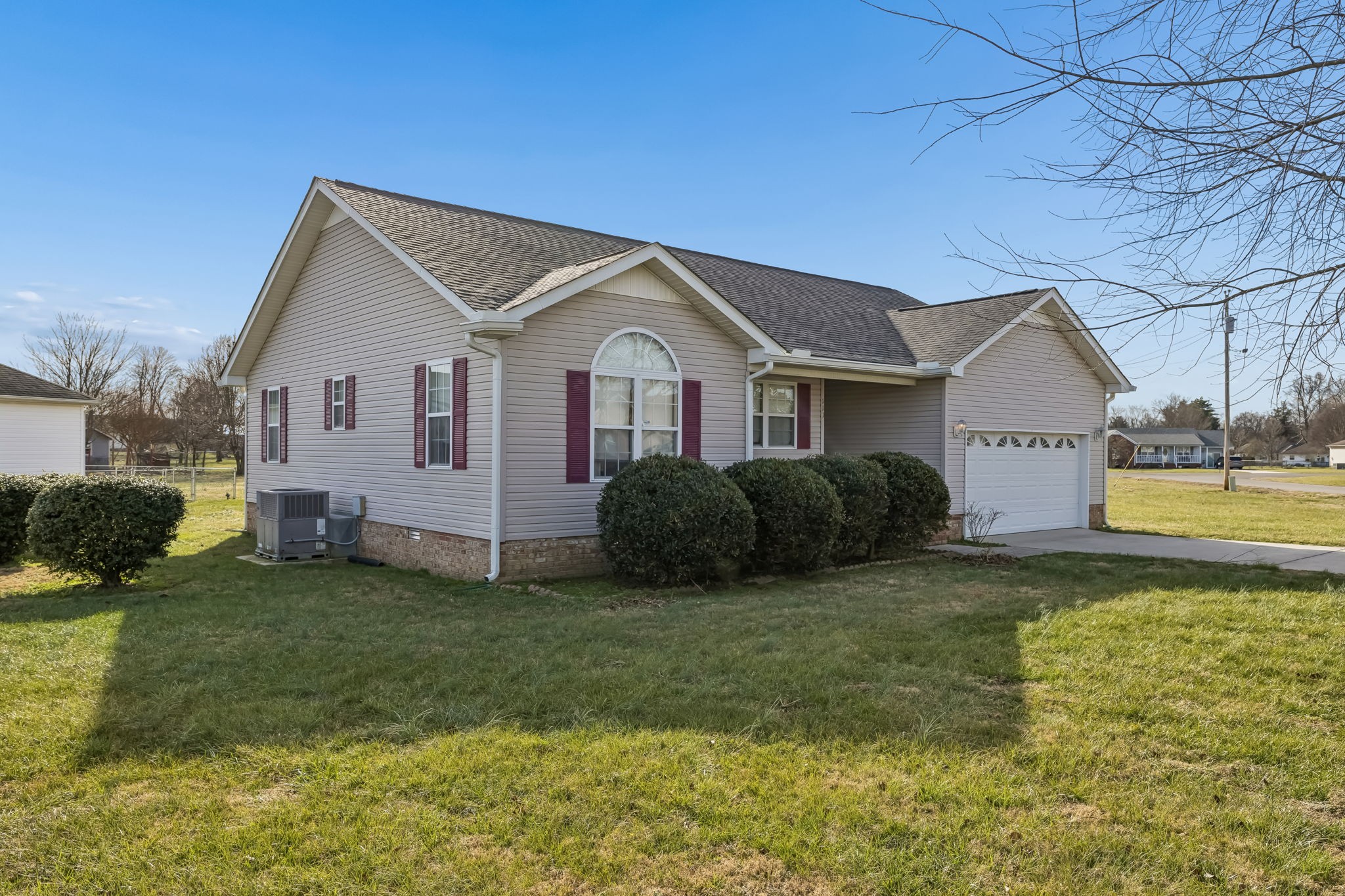 111 Eldon Drive Manchester, TN 37355 - Photo 4 of 24 a front view of a house with a yard