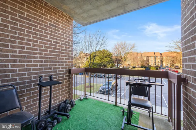 a view of a bench in the backyard