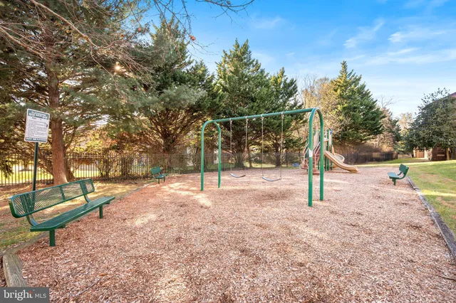 a view of a park with swings