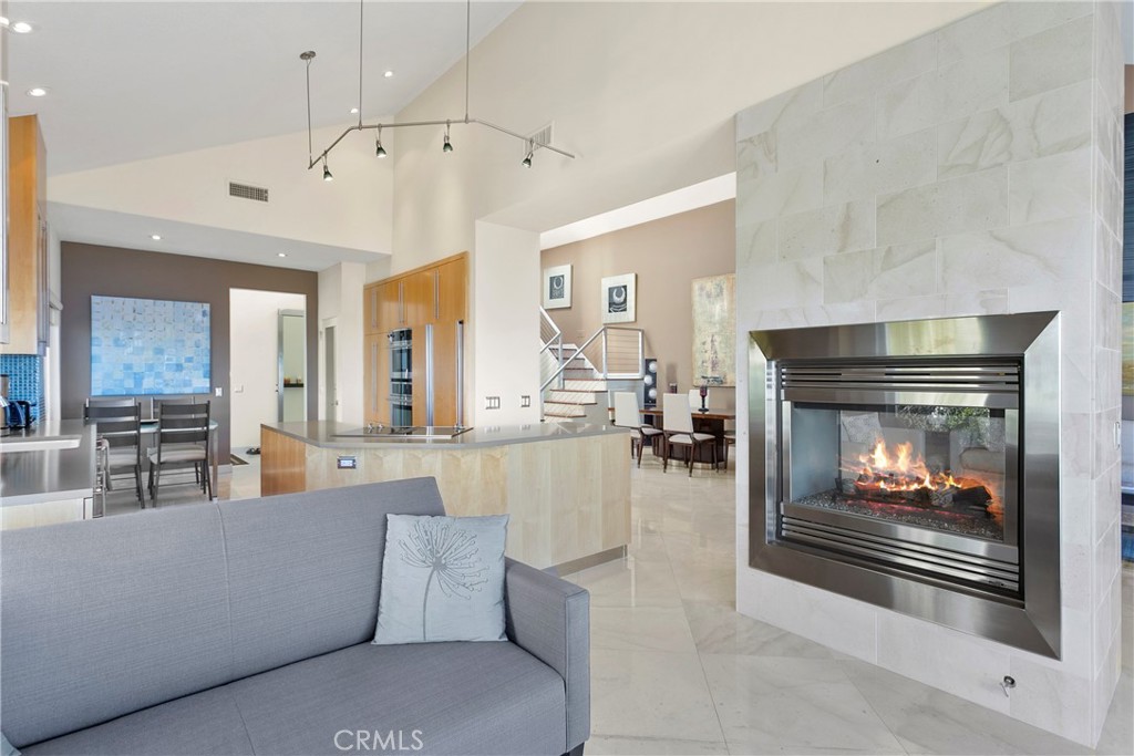 25 St Raphael Laguna Niguel, CA 92677 - Photo 11 of 23 a living room with furniture and a fireplace