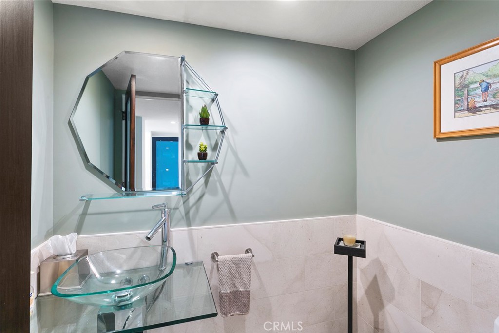 25 St Raphael Laguna Niguel, CA 92677 - Photo 13 of 23 a bathroom with a sink and a mirror