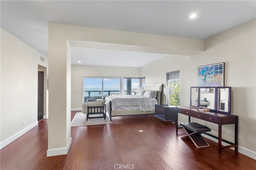 25 St Raphael Laguna Niguel, CA 92677 - Photo 15 of 23 a living room with furniture and a wooden floor