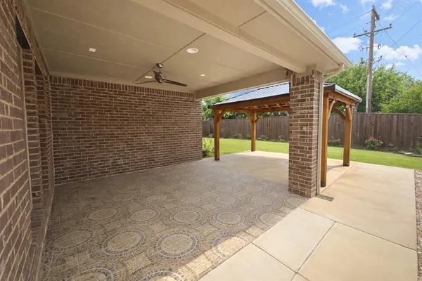 a backyard of a house with lots of green space