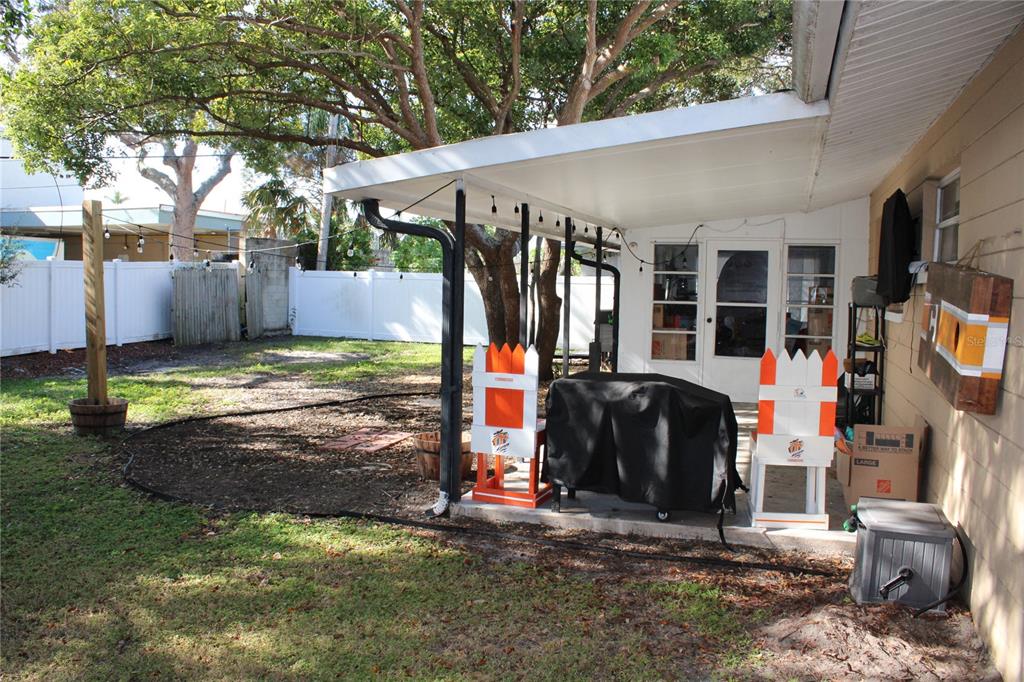 11364 79th Avenue Seminole, FL 33772 - Photo 22 of 28 a view of a house with backyard and sitting area