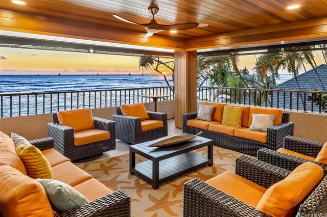 a outdoor living space with furniture and a potted plant