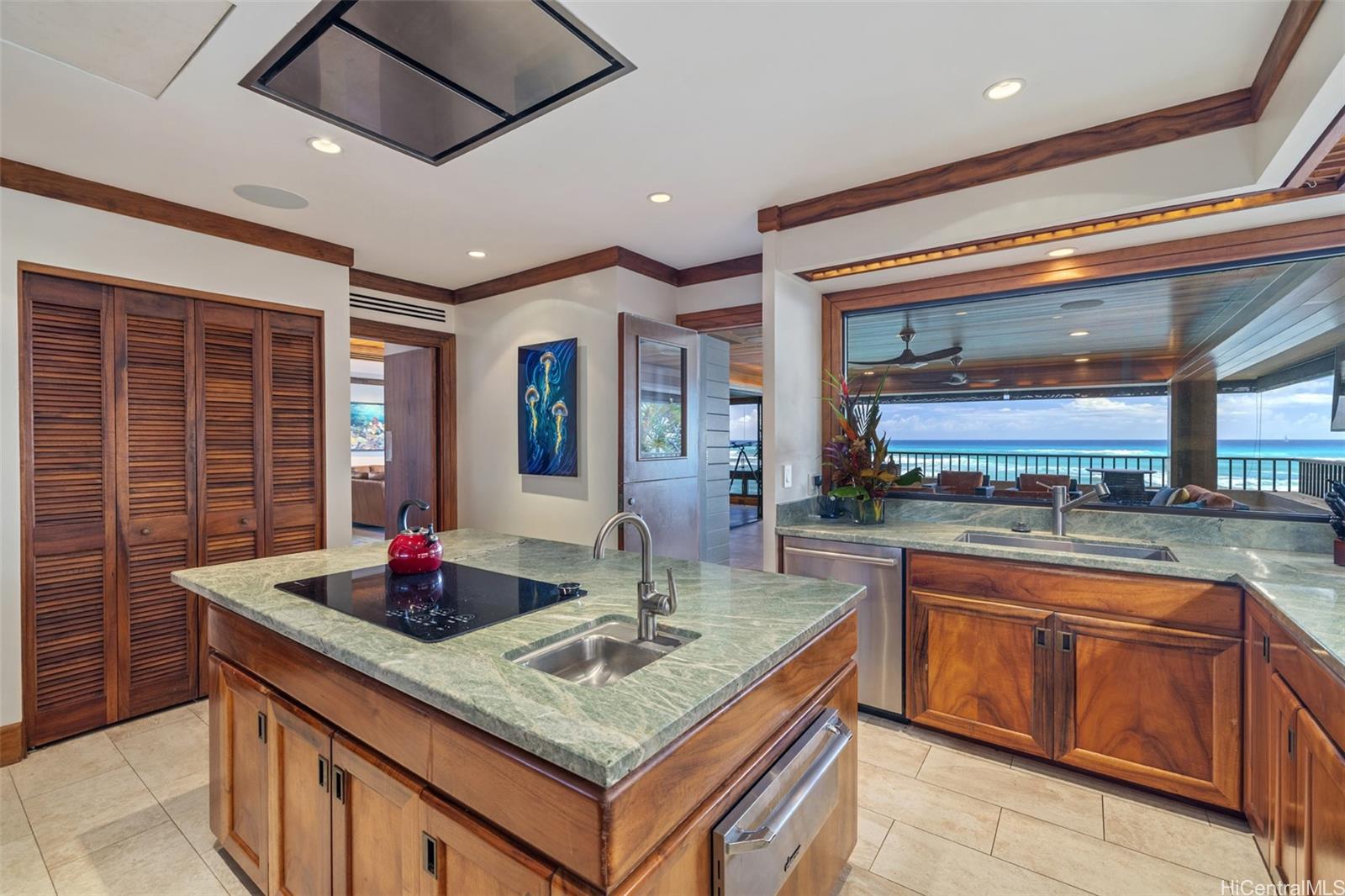 3165 Diamond Head Road, Unit 4 Honolulu, HI 96815 - Photo 12 of 25 a kitchen with stainless steel appliances granite countertop a sink and cabinets