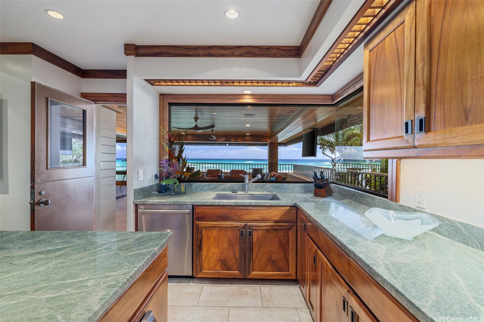 3165 Diamond Head Road, Unit 4 Honolulu, HI 96815 - Photo 13 of 25 a kitchen with a sink and cabinets