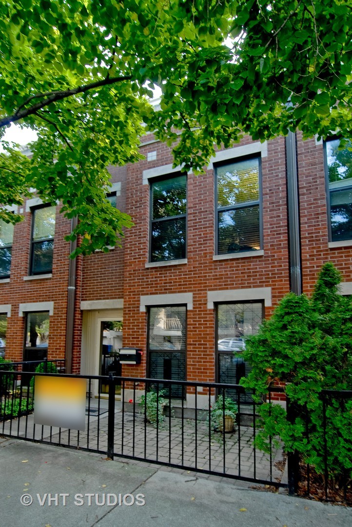 1722 North Bissell Street Chicago, IL 60614 - Photo 1 of 8 a view of a house with a patio