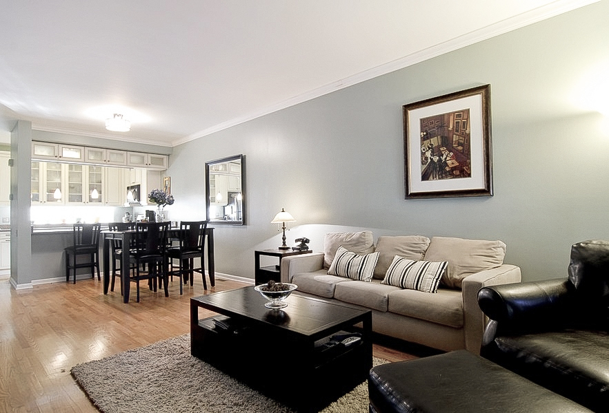 1722 North Bissell Street Chicago, IL 60614 - Photo 2 of 8 a living room with furniture and a dining table