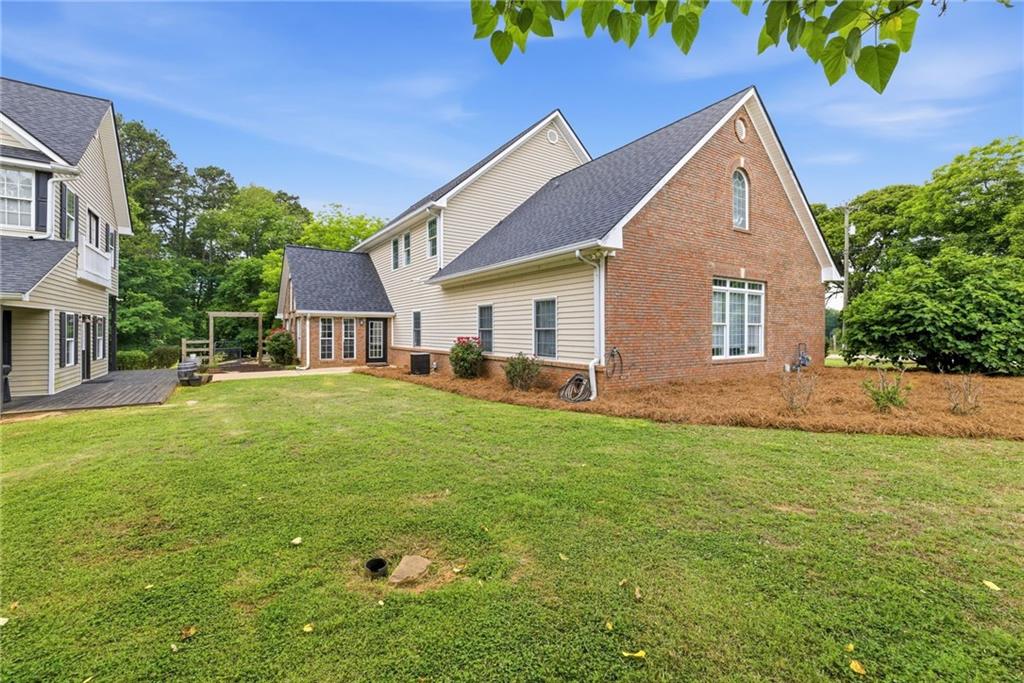4337 Mountain View Road Oakwood, GA 30566 - Photo 68 of 84 a front view of house with yard and green space