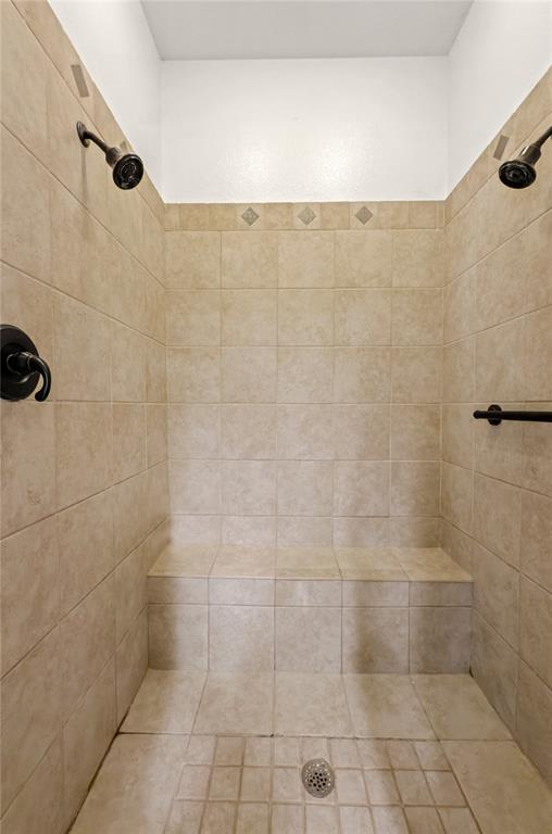 396 Ranchview Court Bowie, TX 76230 - Photo 14 of 40 a bathroom with a shower