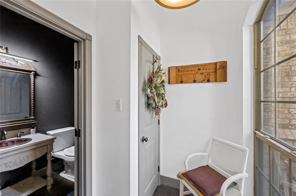 396 Ranchview Court Bowie, TX 76230 - Photo 16 of 40 a bathroom with a sink and a mirror