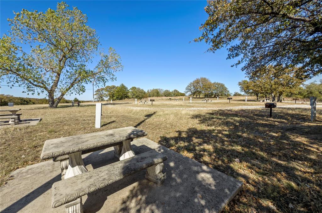 396 Ranchview Court Bowie, TX 76230 - Photo 36 of 40 a view of an ocean and a building