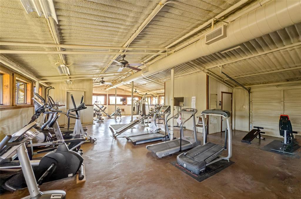 396 Ranchview Court Bowie, TX 76230 - Photo 37 of 40 a view of a room with gym equipment
