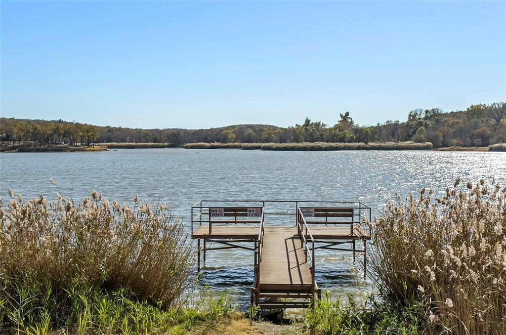 396 Ranchview Court Bowie, TX 76230 - Photo 39 of 40 a view of lake with mountain