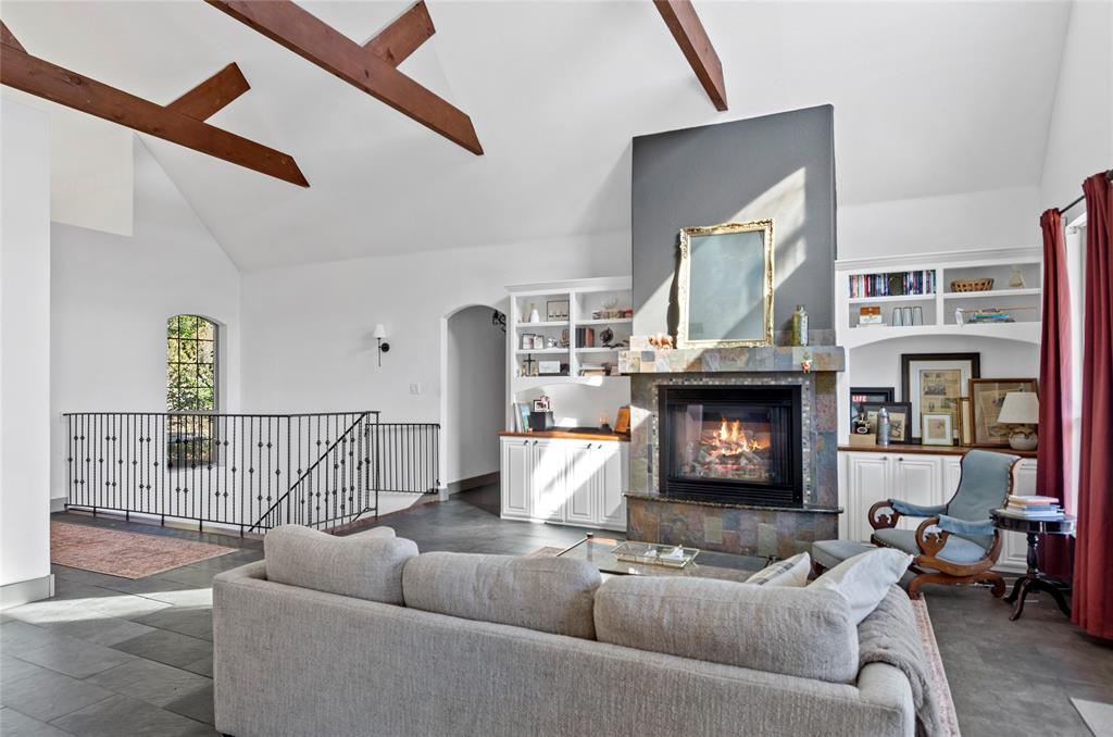 396 Ranchview Court Bowie, TX 76230 - Photo 6 of 40 a living room with furniture and a fireplace