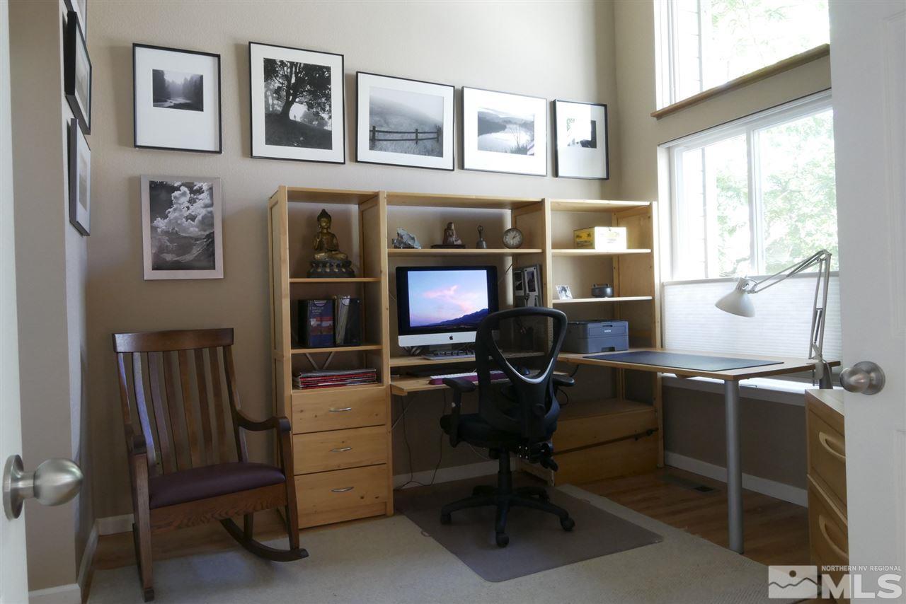 3288 Alum Creek Court Reno, NV 89509 - Photo 11 of 20 a view of a workspace with furniture and a window