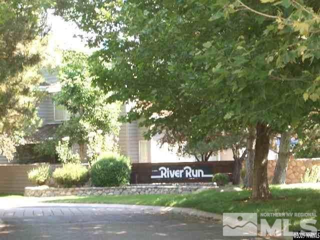 3288 Alum Creek Court Reno, NV 89509 - Photo 20 of 20 a sign that is sitting in front of a tree