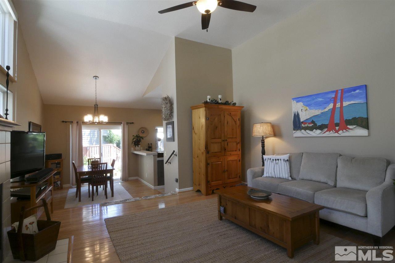3288 Alum Creek Court Reno, NV 89509 - Photo 5 of 20 a living room with furniture and a flat screen tv