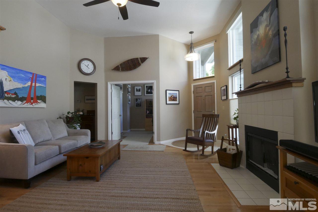 3288 Alum Creek Court Reno, NV 89509 - Photo 6 of 20 a living room with furniture and a fireplace