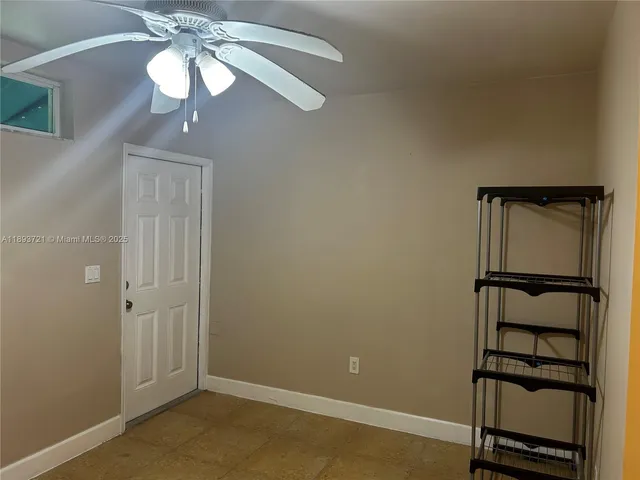 a kitchen that has a sink stainless steel appliances and cabinets