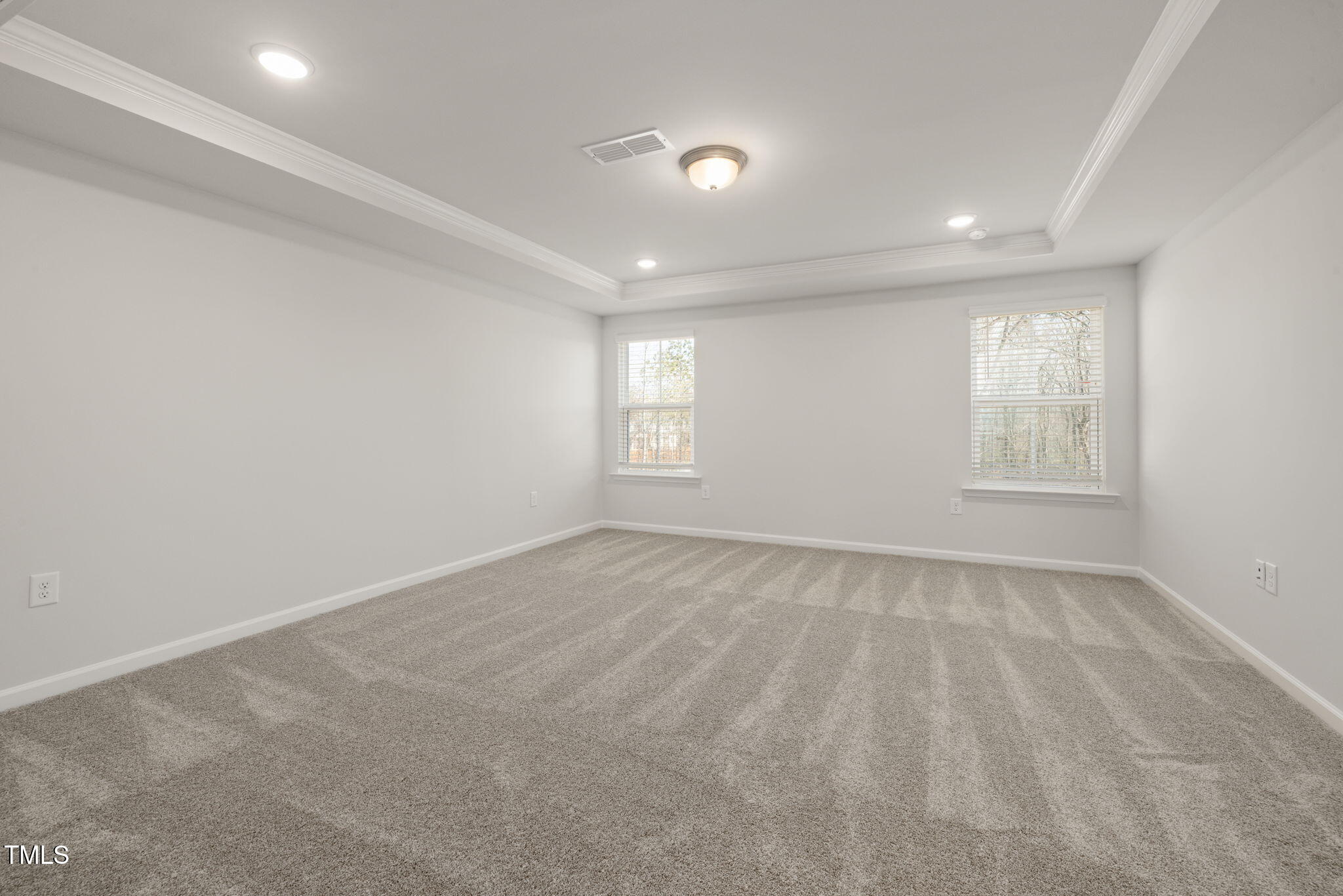 1018 Freestone Road Durham, NC 27703 - Photo 5 of 16 a view of an empty room and window