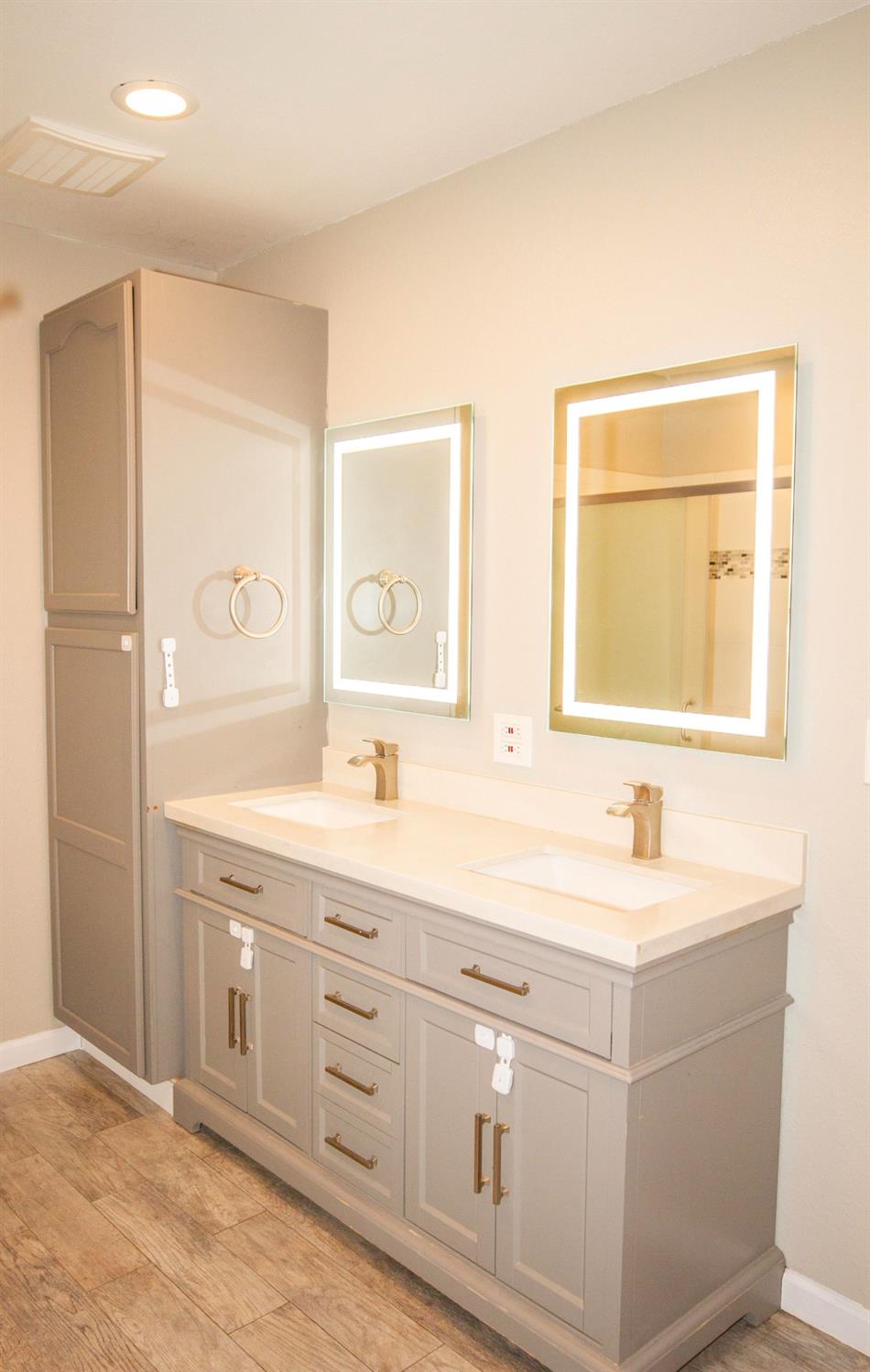 5357 South Hills Valley Road Orange Cove, CA 93646 - Photo 27 of 55 a bathroom with a sink and a mirror