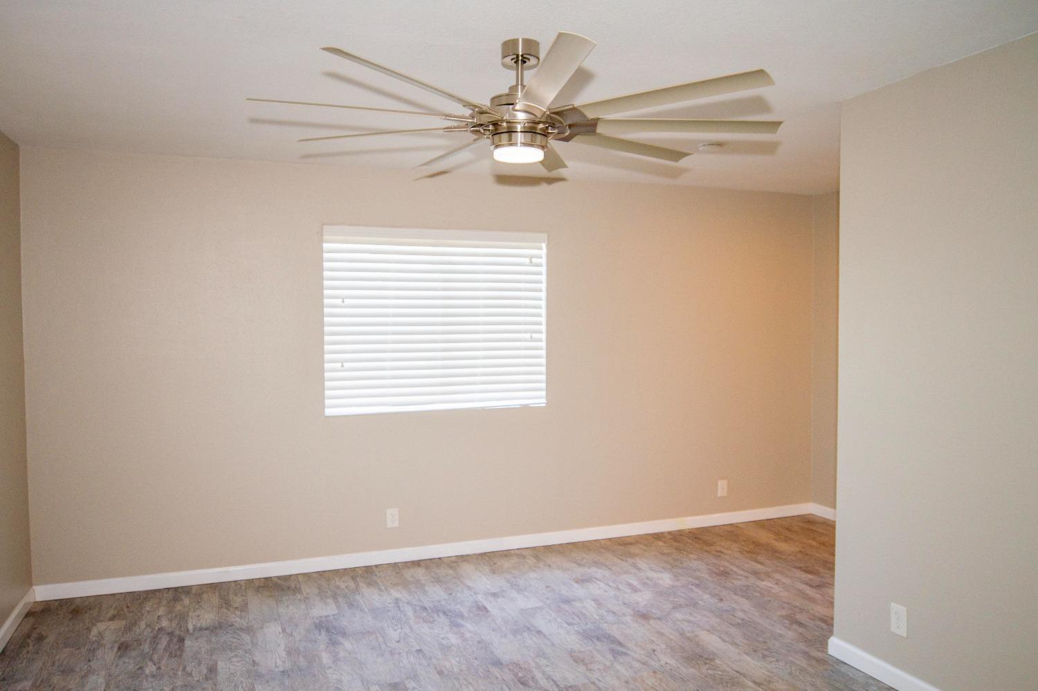 5357 South Hills Valley Road Orange Cove, CA 93646 - Photo 5 of 55 a view of an empty room with a window