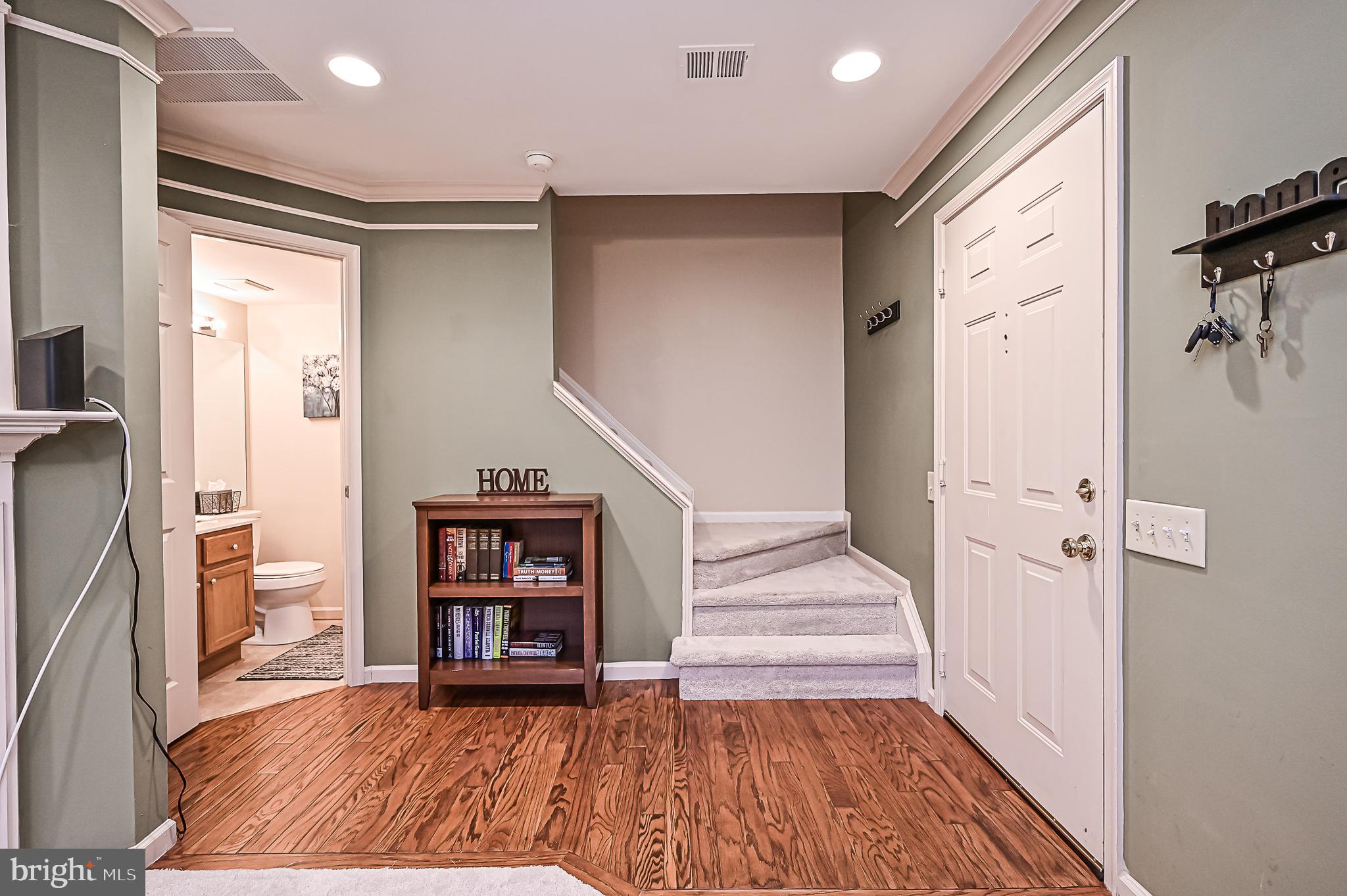 11197 Rienzi Place, Unit 201 Manassas, VA 20109 - Photo 2 of 22 Welcoming Foyer with Hardwood Floors