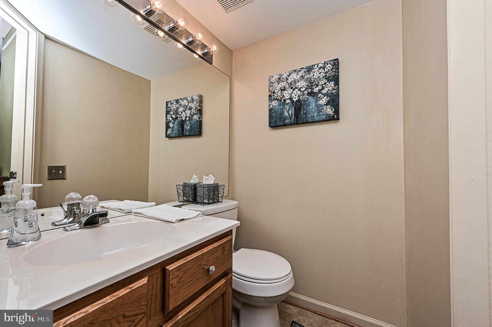 11197 Rienzi Place, Unit 201 Manassas, VA 20109 - Photo 3 of 22 Main Level Powder Room